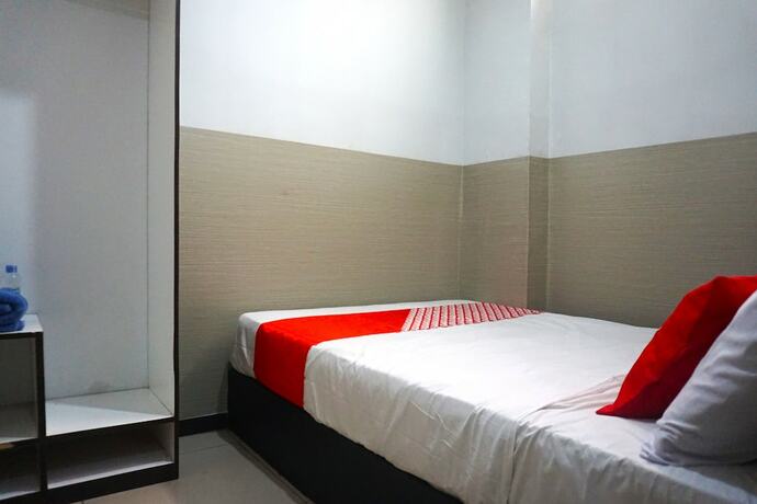 Imagen de la habitación del Hotel Super Capital O 3952 C 18 Cibaduyut. Foto 18