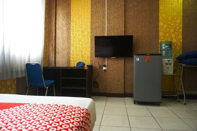 Imagen de la habitación del Hotel Super Capital O 3952 C 18 Cibaduyut. Foto 19