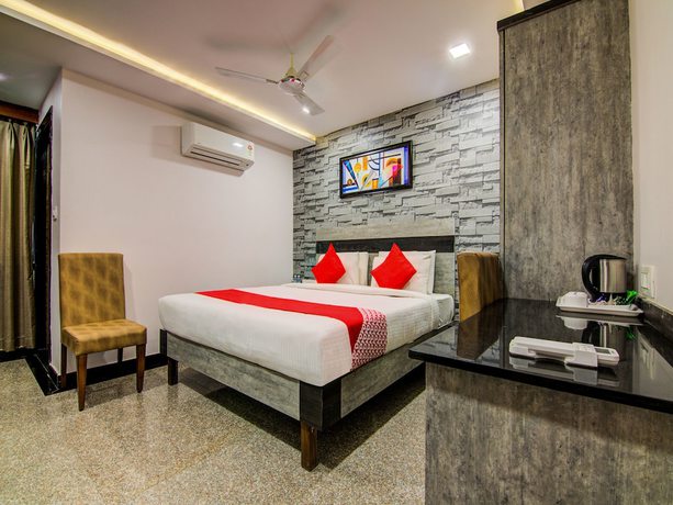 Imagen de la habitación del Hotel Super Capital O Pratibha Grand. Foto 10