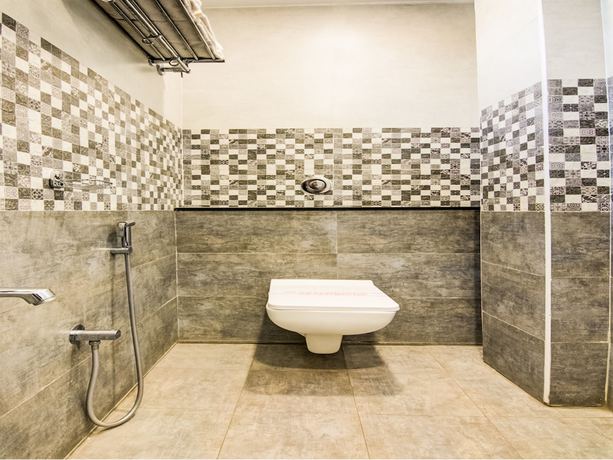 Imagen de la habitación del Hotel Super Capital O Pratibha Grand. Foto 16