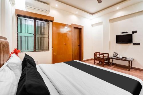 Imagen de la habitación del Hotel Super Collection O Ratan Lal Nagar. Foto 20