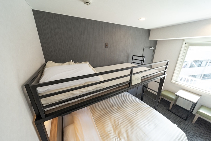 Imagen de la habitación del Hotel Super Hiroshima Natural Hot Springs Yagenboridori. Foto 11