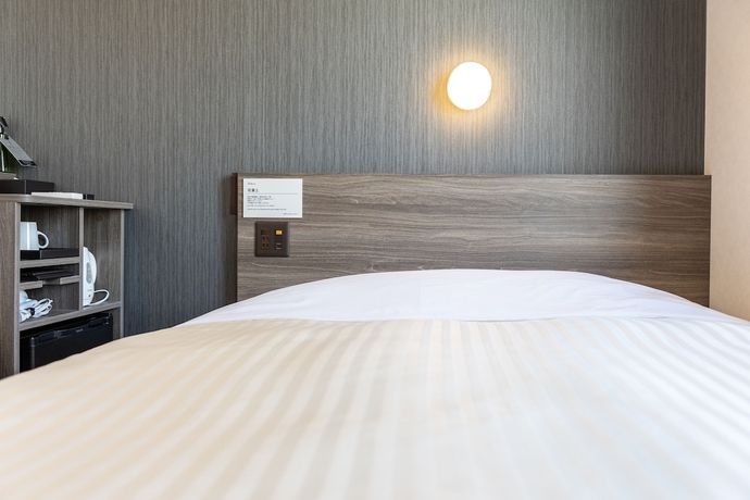 Imagen de la habitación del Hotel Super Hiroshima Natural Hot Springs Yagenboridori. Foto 18