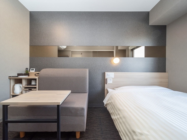 Imagen de la habitación del Hotel Super Hotel Kanku Kumatoriekimae. Foto 12