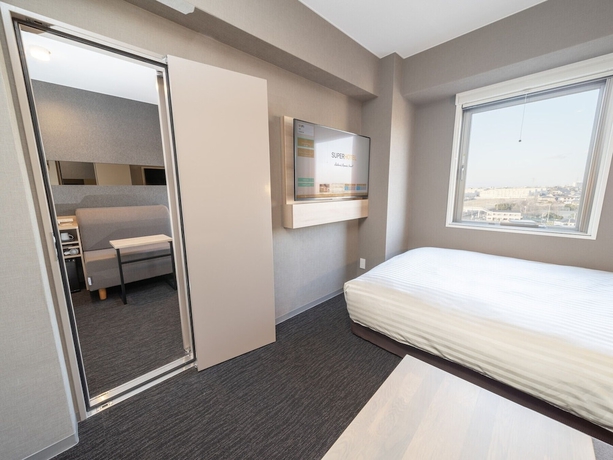 Imagen de la habitación del Hotel Super Hotel Kanku Kumatoriekimae. Foto 18