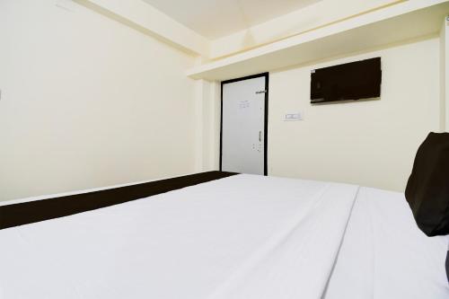 Imagen de la habitación del Hotel Super Hotel O Khandagiri Near DN Regalia Mall. Foto 7