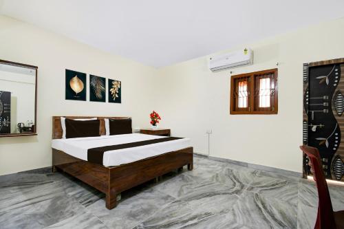 Imagen de la habitación del Hotel Super Hotel O Khandagiri Near DN Regalia Mall. Foto 9