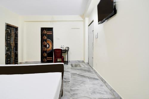 Imagen de la habitación del Hotel Super Hotel O Khandagiri Near DN Regalia Mall. Foto 10