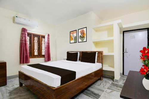 Imagen de la habitación del Hotel Super Hotel O Khandagiri Near DN Regalia Mall. Foto 11