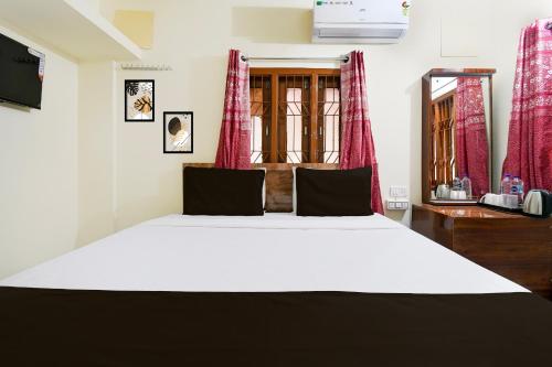 Imagen de la habitación del Hotel Super Hotel O Khandagiri Near DN Regalia Mall. Foto 12