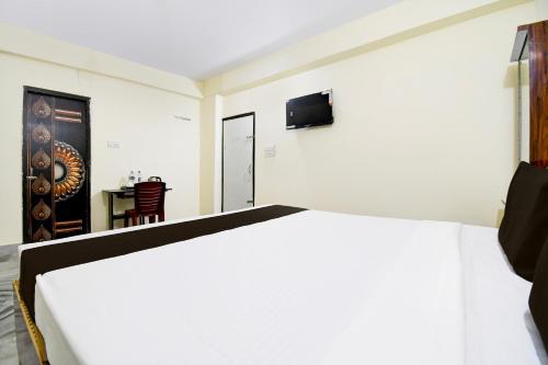 Imagen de la habitación del Hotel Super Hotel O Khandagiri Near DN Regalia Mall. Foto 14