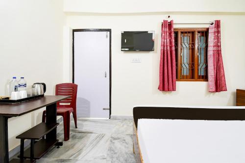 Imagen de la habitación del Hotel Super Hotel O Khandagiri Near DN Regalia Mall. Foto 16