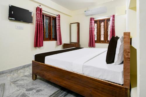 Imagen de la habitación del Hotel Super Hotel O Khandagiri Near DN Regalia Mall. Foto 20