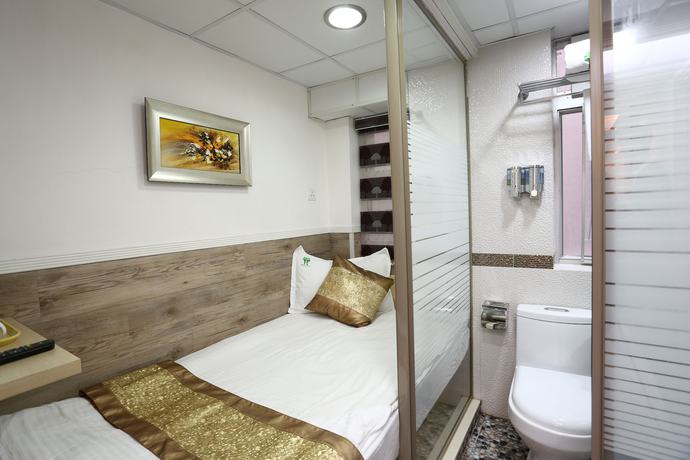Imagen de la habitación del Hotel Super Inn, Hong Kong. Foto 10