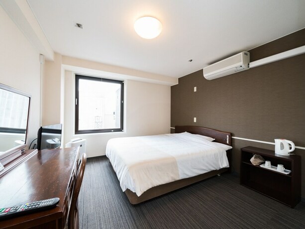 Imagen de la habitación del Hotel Super Inn Sendai Kokubuncho. Foto 8