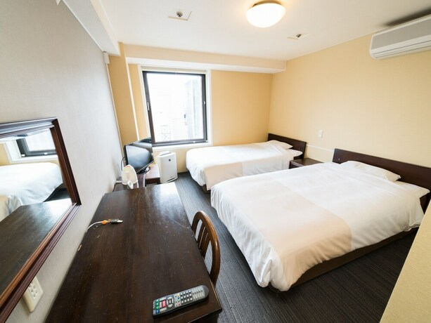 Imagen de la habitación del Hotel Super Inn Sendai Kokubuncho. Foto 9