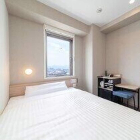 Imagen de la habitación del Hotel Super Iyosaijo. Foto 9