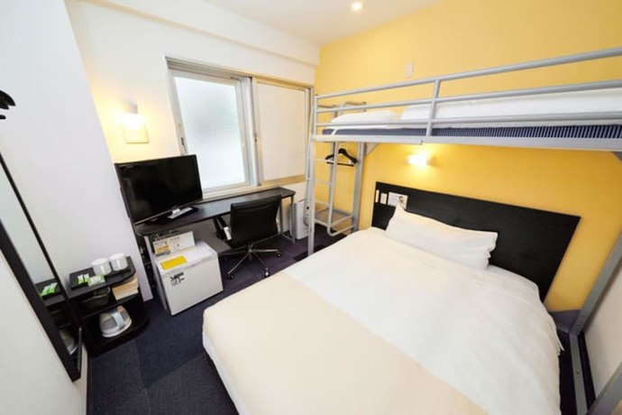 Imagen de la habitación del Hotel Super Jr Shin-osaka Higashiguchi. Foto 6