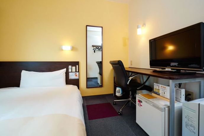 Imagen de la habitación del Hotel Super Jr Shin-osaka Higashiguchi. Foto 8