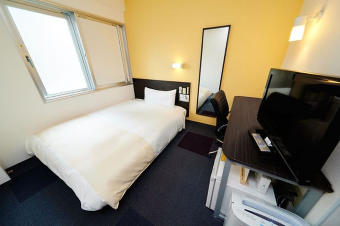 Imagen de la habitación del Hotel Super Jr Shin-osaka Higashiguchi. Foto 9