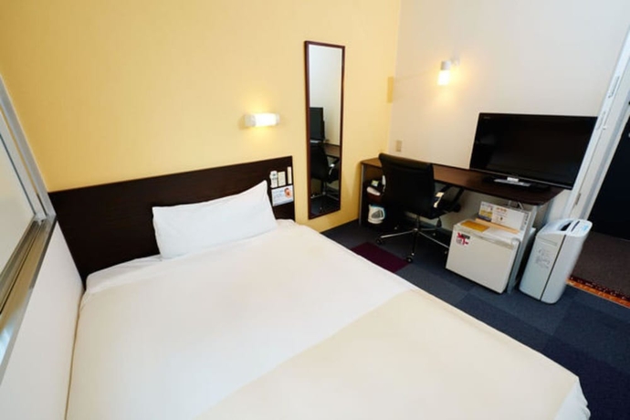 Imagen de la habitación del Hotel Super Jr Shin-osaka Higashiguchi. Foto 10