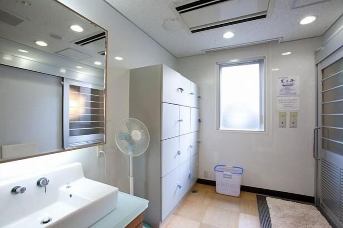 Imagen de la habitación del Hotel Super Jr Shin-osaka Higashiguchi. Foto 16