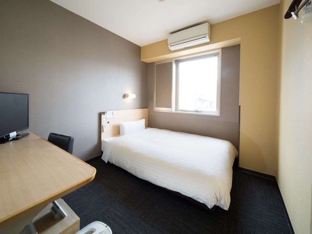 Imagen de la habitación del Hotel Super Kadoma. Foto 9