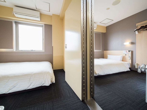 Imagen de la habitación del Hotel Super Kadoma. Foto 10