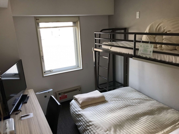 Imagen de la habitación del Hotel Super Kitami. Foto 15