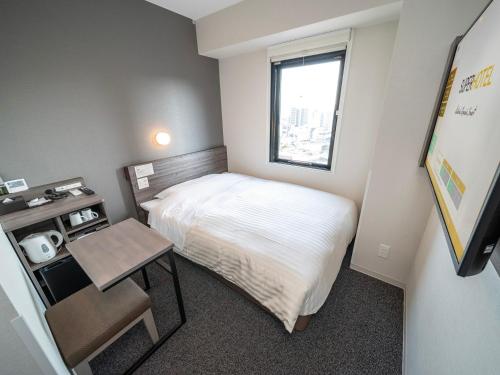 Imagen de la habitación del Hotel Super Kumamoto Ekimae Natural Hot Springs. Foto 16