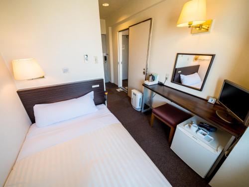 Imagen de la habitación del Hotel Super Matsusaka. Foto 7