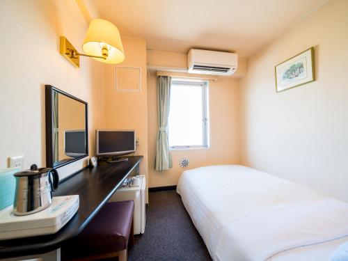 Imagen de la habitación del Hotel Super Matsusaka. Foto 8