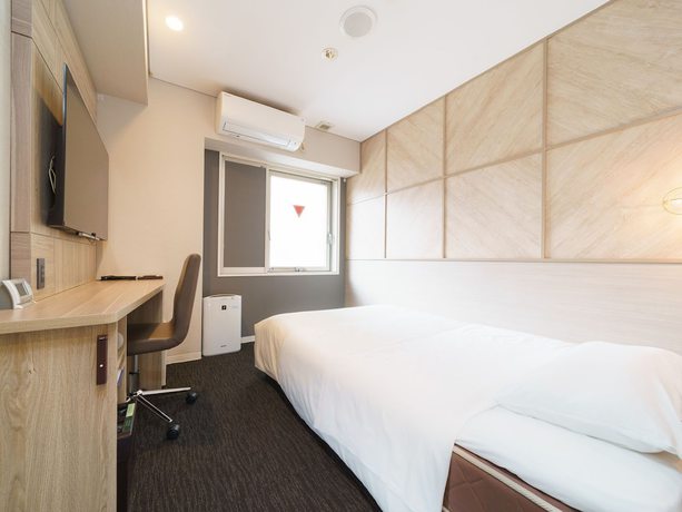 Imagen de la habitación del Hotel Super Midousuji Line Esaka. Foto 12