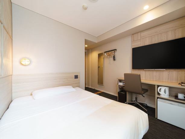 Imagen de la habitación del Hotel Super Midousuji Line Esaka. Foto 13