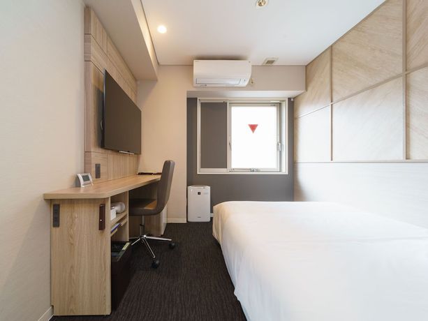 Imagen de la habitación del Hotel Super Midousuji Line Esaka. Foto 15