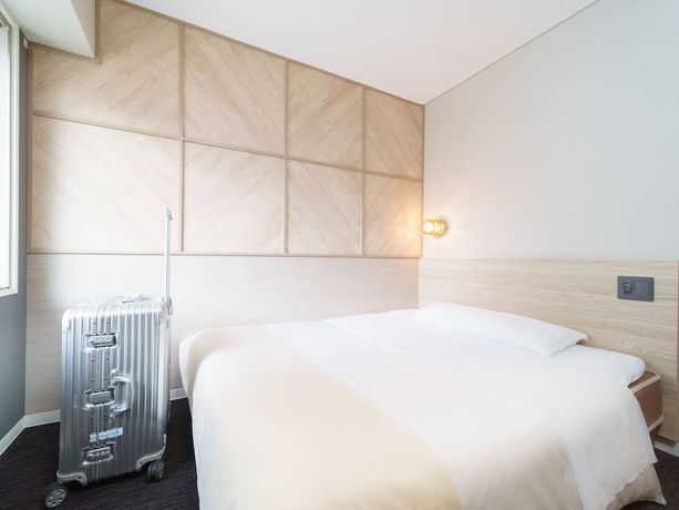 Imagen de la habitación del Hotel Super Midousuji Line Esaka. Foto 18