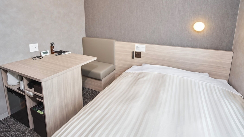 Imagen de la habitación del Hotel Super Nagasaki Isahaya Natural Hot Spring. Foto 15