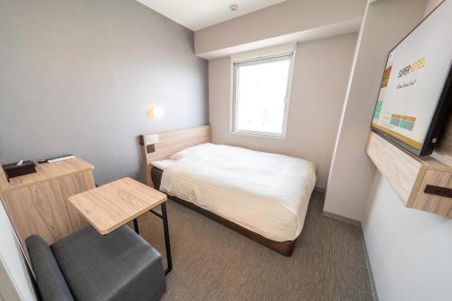 Imagen de la habitación del Hotel Super Nagoya Shinkansenguchi. Foto 17