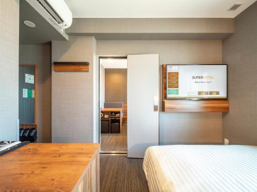 Imagen de la habitación del Hotel Super Nagoya Shinkansenguchi. Foto 20