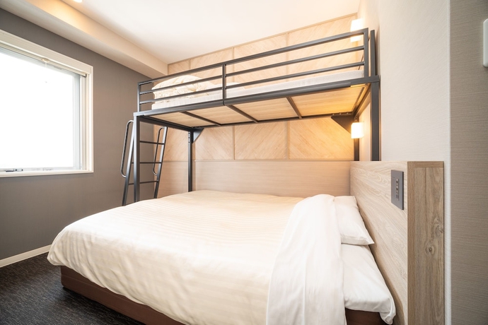 Imagen de la habitación del Hotel Super Niihama. Foto 2