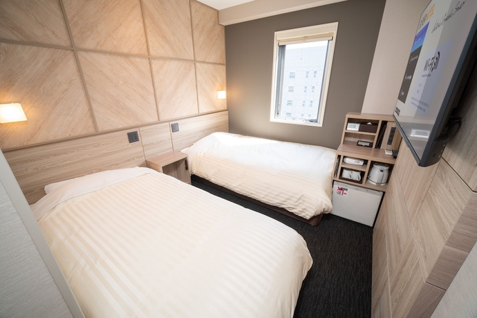 Imagen de la habitación del Hotel Super Niihama. Foto 4