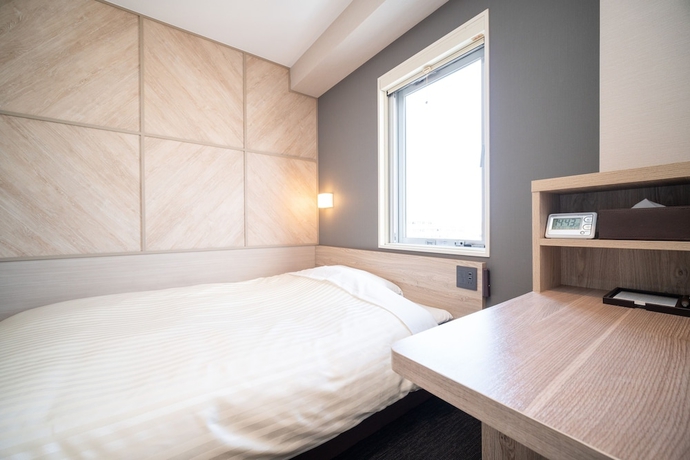 Imagen de la habitación del Hotel Super Niihama. Foto 9
