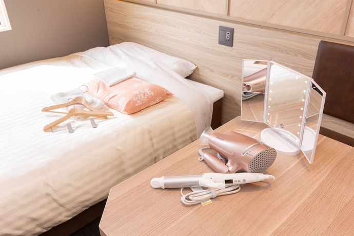 Imagen de la habitación del Hotel Super Niihama. Foto 10