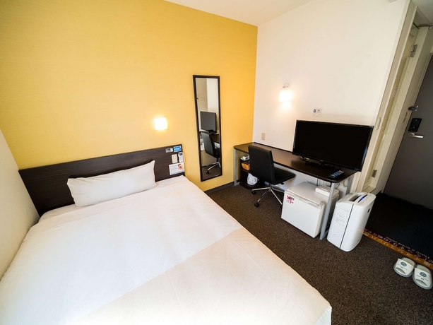 Imagen de la habitación del Hotel Super Niihama. Foto 12