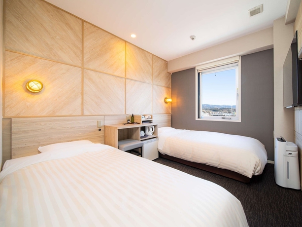 Imagen de la habitación del Hotel Super Niihama. Foto 14