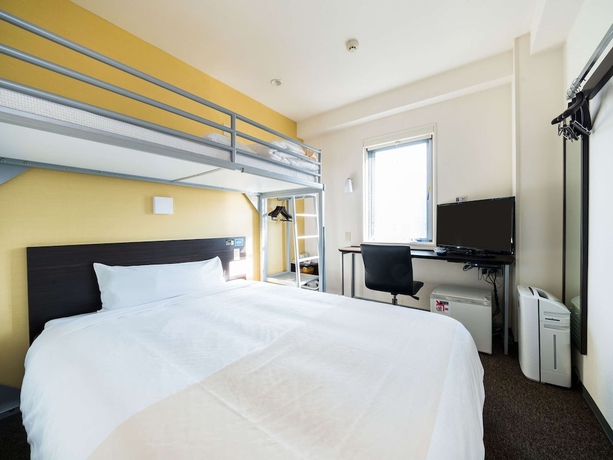Imagen de la habitación del Hotel Super Niihama. Foto 15