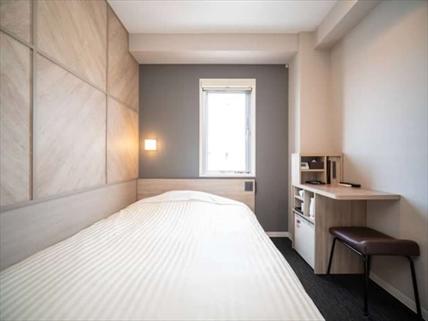 Imagen de la habitación del Hotel Super Niihama. Foto 16