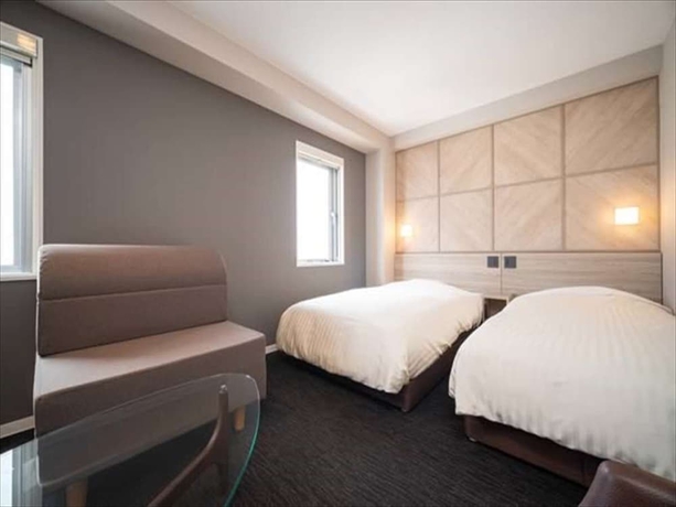 Imagen de la habitación del Hotel Super Niihama. Foto 17