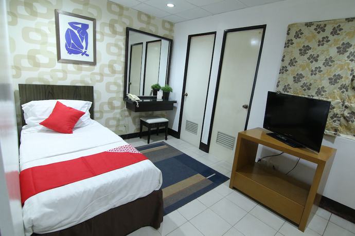 Imagen de la habitación del Hotel Super OYO 107 Orange Nest. Foto 2