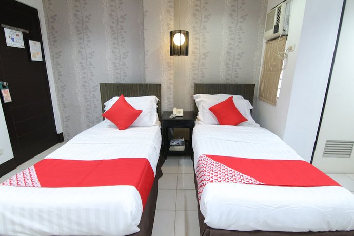 Imagen de la habitación del Hotel Super OYO 107 Orange Nest. Foto 3